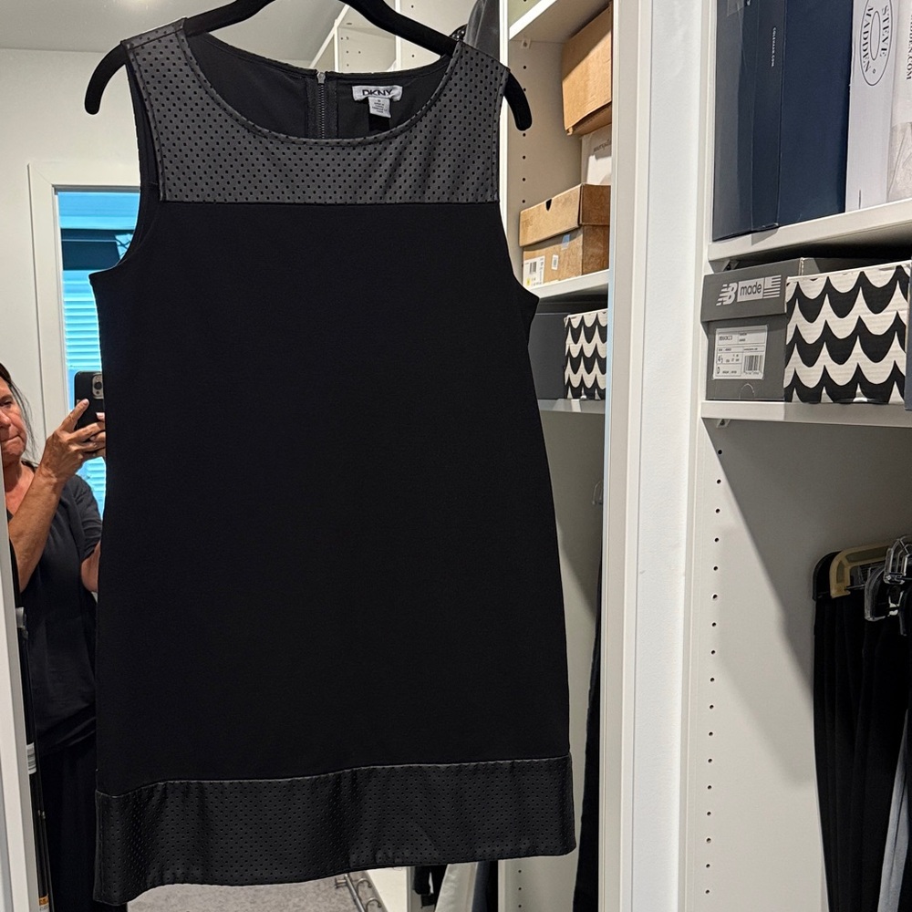 DKNY Black Dress with leather Polka Dot Accents on top and bottom hem.